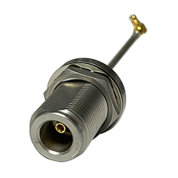 Female N connector, straight orientation with a bulkhead rear mount plated with nickel and fits cable semi-rigid